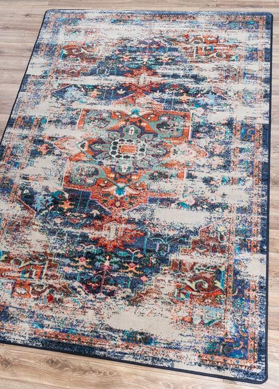 Achieve the best of both worlds with this striking area rug.  The saturated colors are softened under the intentionally distressed areas . Bring some instant impact into your décor with this sophisticated rug.